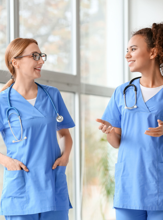 two nurses talking